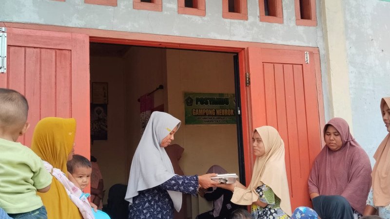 Gampong Neurok Mendapatkan Program Makanan Bergizi Gratis (MBG) yang Disalurkan Melalui Kader Posyandu